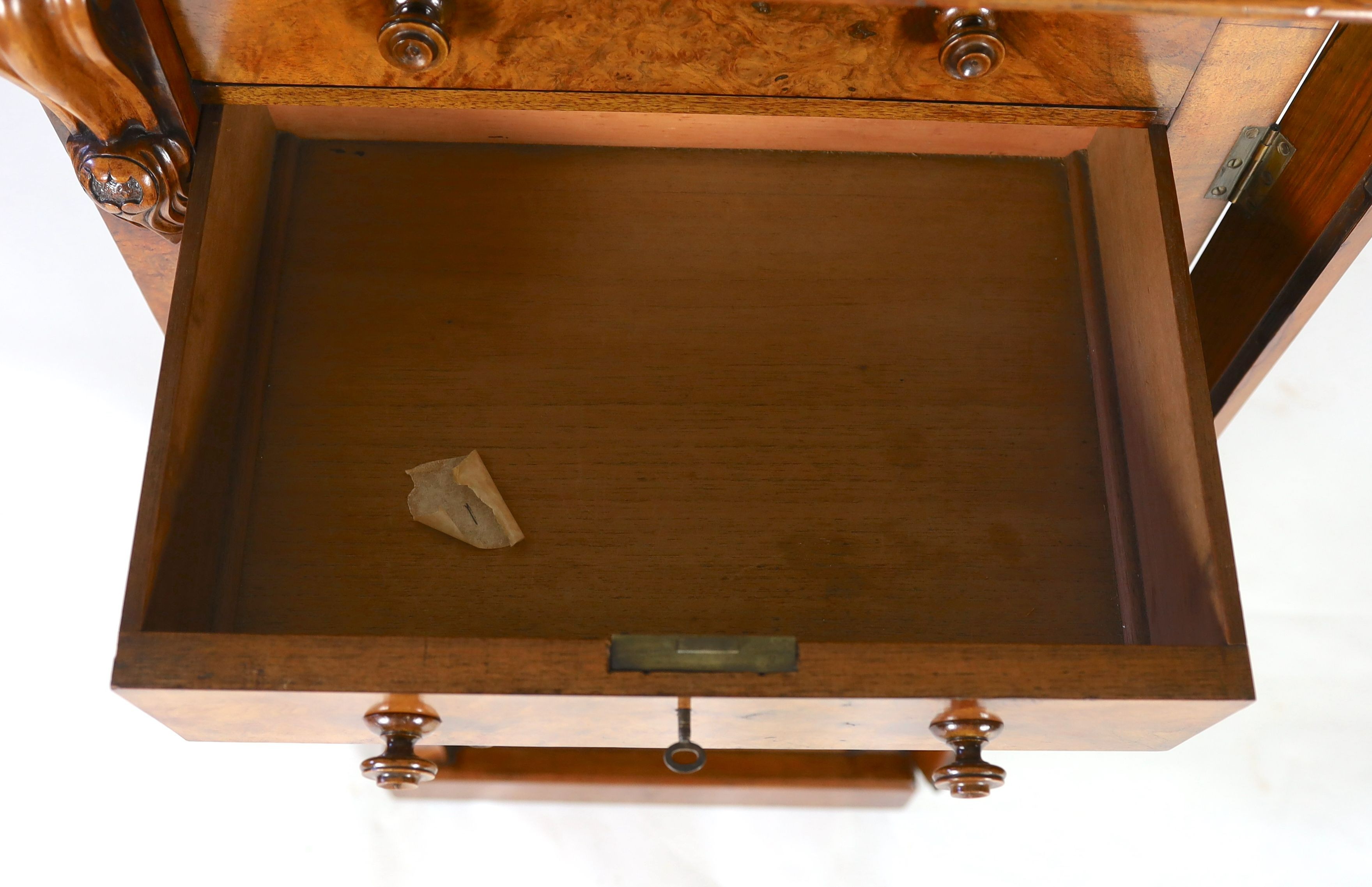 A Victorian figured walnut secretaire Wellington chest, W.59cm D.43cm H.124cm
